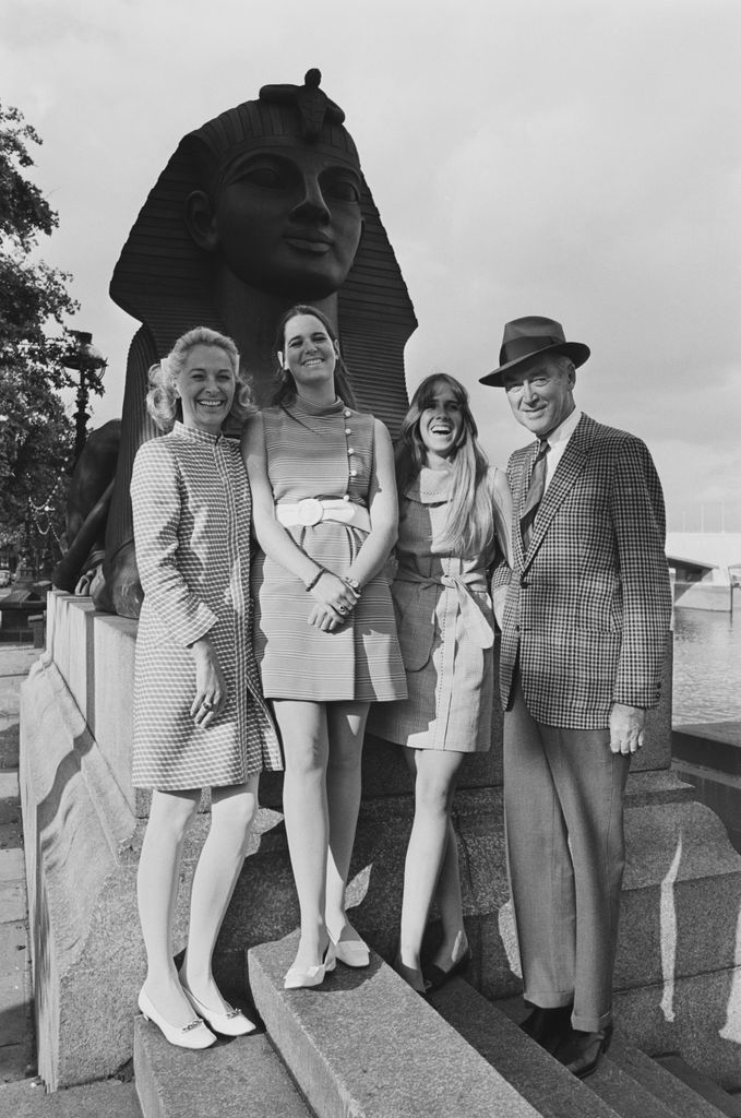 American actor James Stewart (1908 - 1997) with his wife, actress and model Gloria Hatrick McLean (1918 - 1994) and their daughters Judy and Kelly, sightseeing in London, UK, 24th June 1968