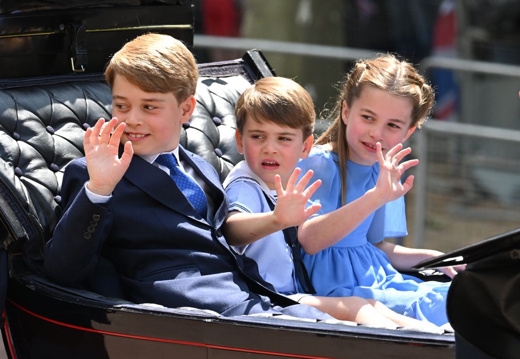 Princess Charlotte, and her two brothers Louis and George waving