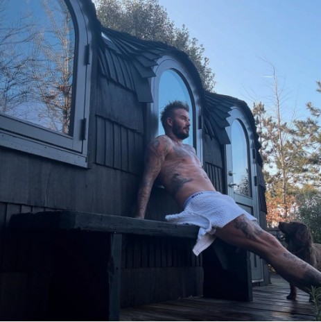 David relaxing outside his sauna 