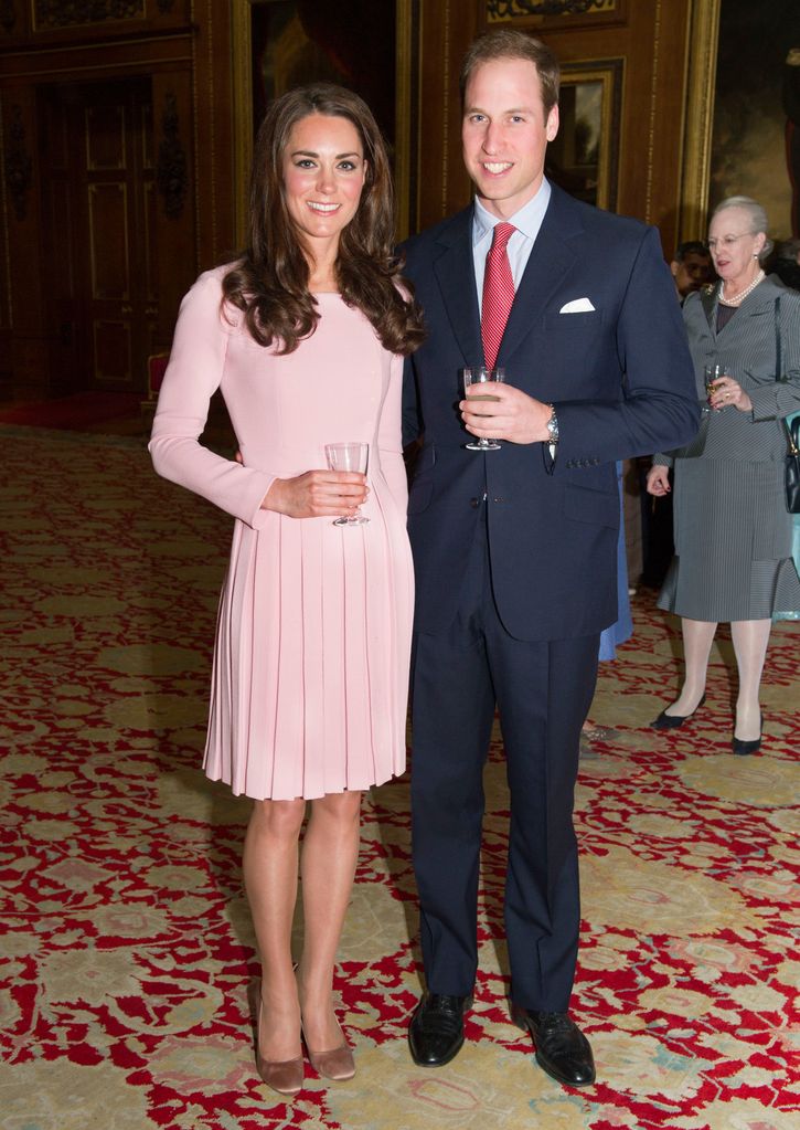 Kate in pink with William in suit
