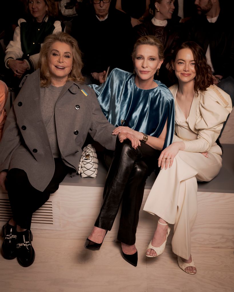 Cate posing on the FROW with Catherine Deneuve and Emma Stone