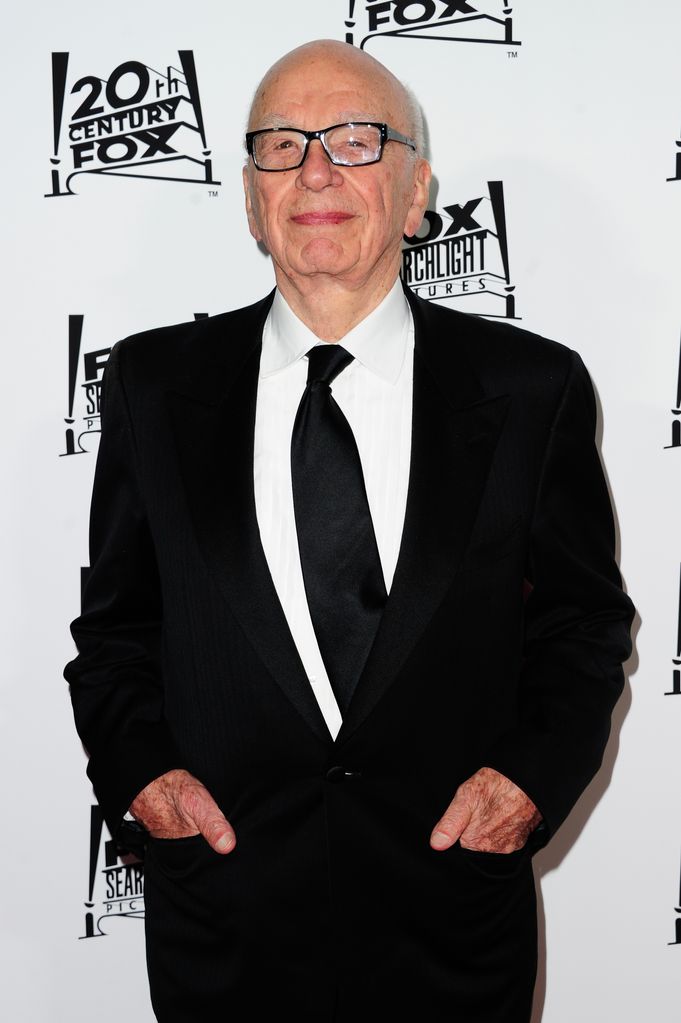 Media mogul Rupert Murdoch in black suit 