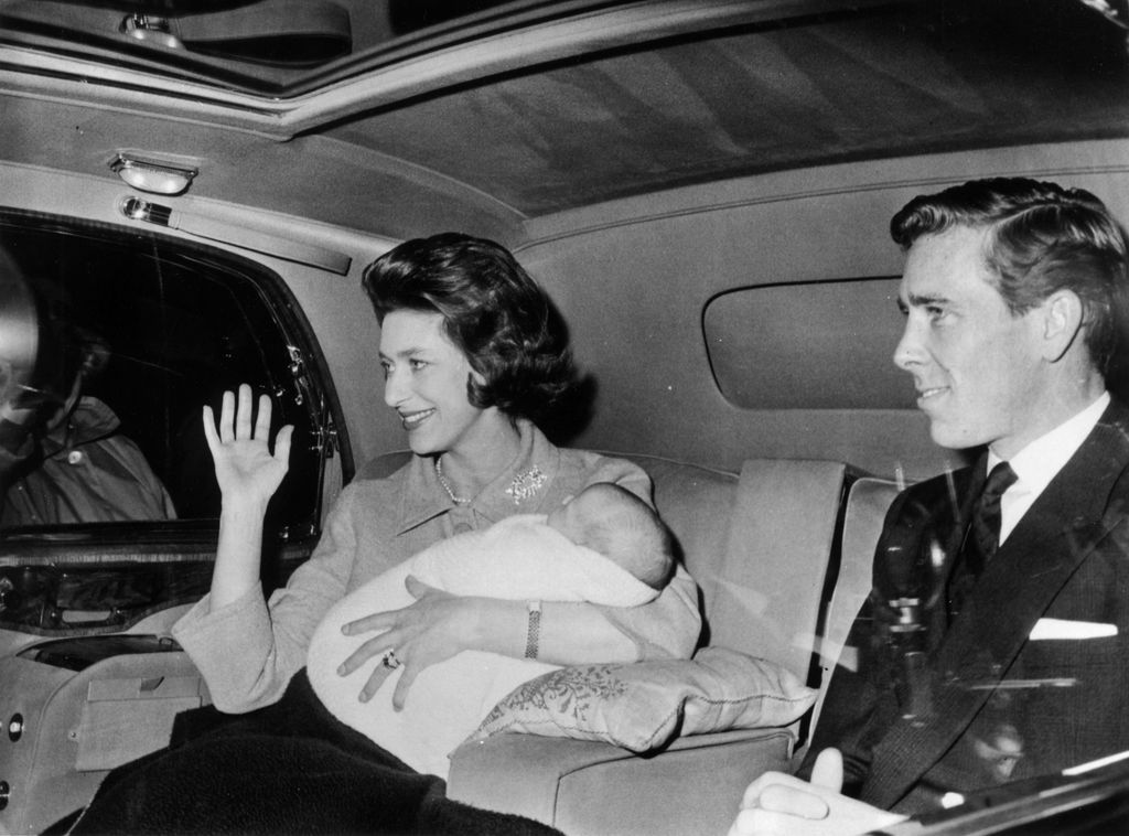 Princess Margaret cradling her newborn son David 