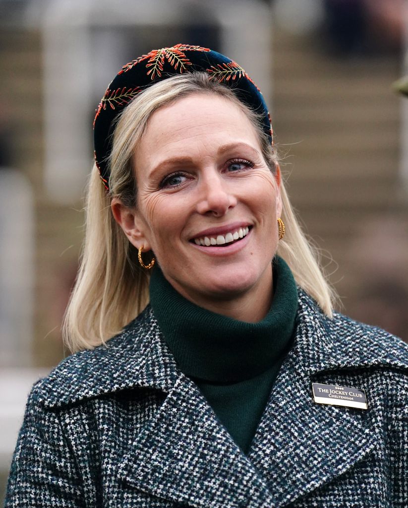 Zara Tindall wearing a headband and checked coat