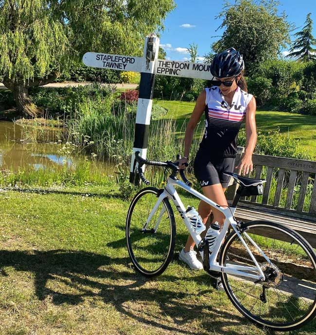 michelle keegan dressed in lycra for a bike ride in the countryside