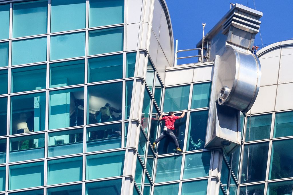US rock climber Alex Honnold scales the Taipei 101 building without ropes or safety gear in Taipei on January 25, 2026.