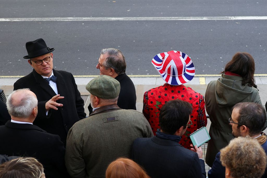  Members of the public gather ahead of the 2025 National Service Of Remembrance at The Cenotaph on November 9, 2025 in London, England.