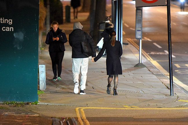 Giovanni Pernice and Jowita hold hands whilst walking