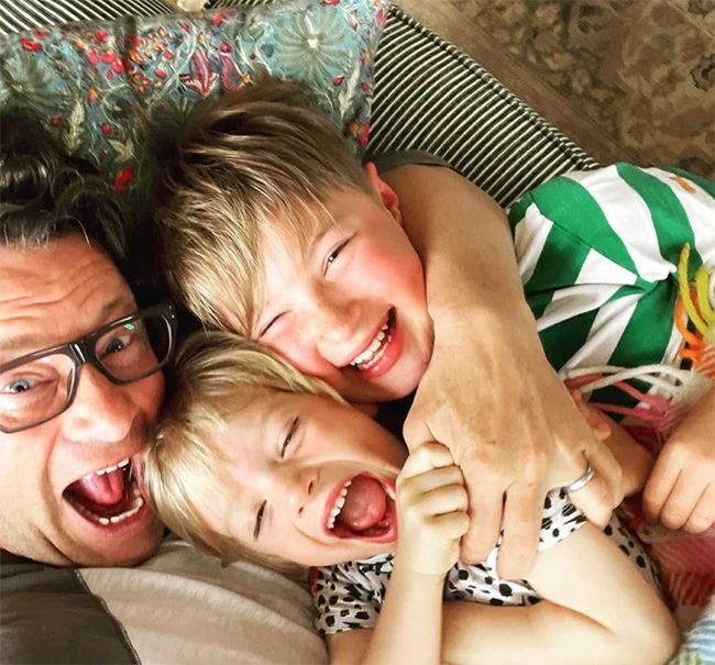 Jamie Oliver cuddling sons Buddy and River