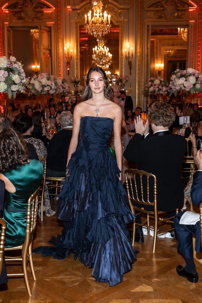 Louisa Dub wers a strapless gothic dress in navy 