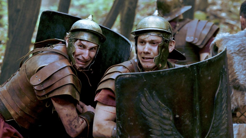 two roman soldiers hoding shields