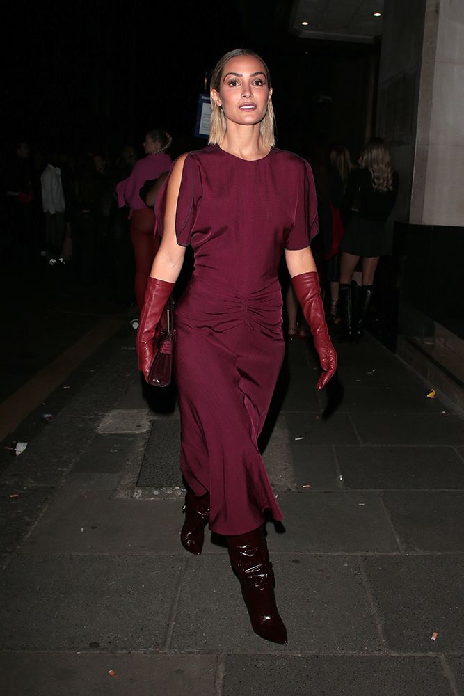 Frankie Bridge wearing a burgundy dress