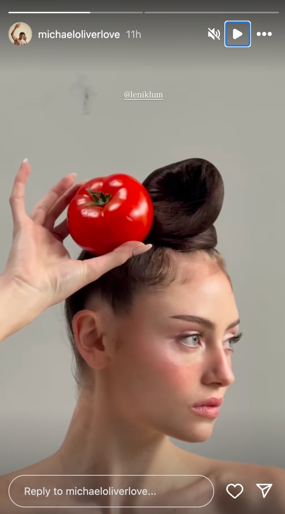 Leni posing with a tomato 