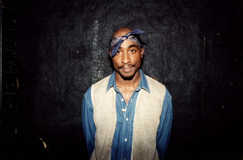 Rapper Tupac Shakur poses for photos backstage after his performance at the Regal Theater in Chicago, Illinois in March 1994