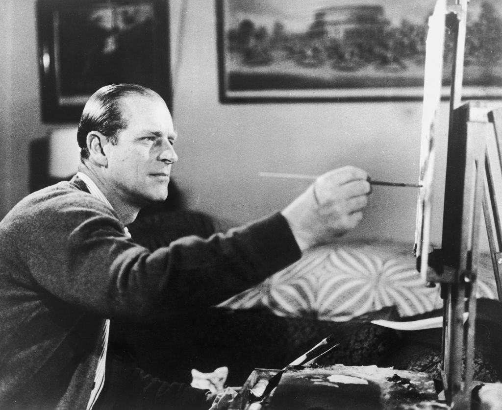 Prince Philip painting on an easel