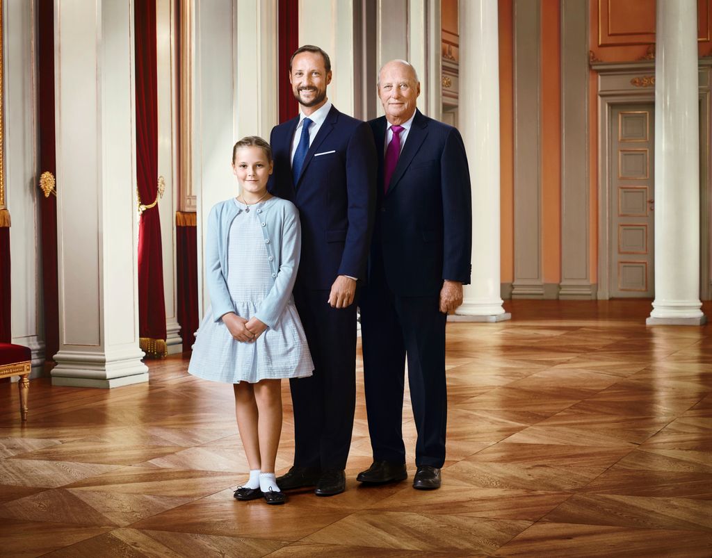 Princess Ingrid Alexandra of Norway, Crown Prince Haakon of Norway and King Harald V of Norway pose for an official photograph in 2016