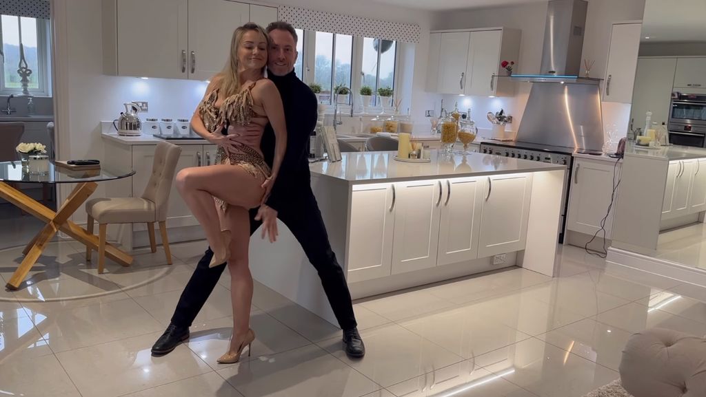 James and Ola dance in their kitchen