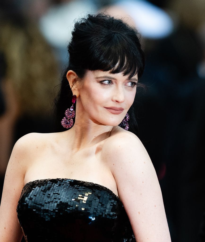 Eva Green attends "Le DeuxieÌme Acte" ("The Second Act") Screening & opening ceremony red carpet at the 77th annual Cannes Film Festival