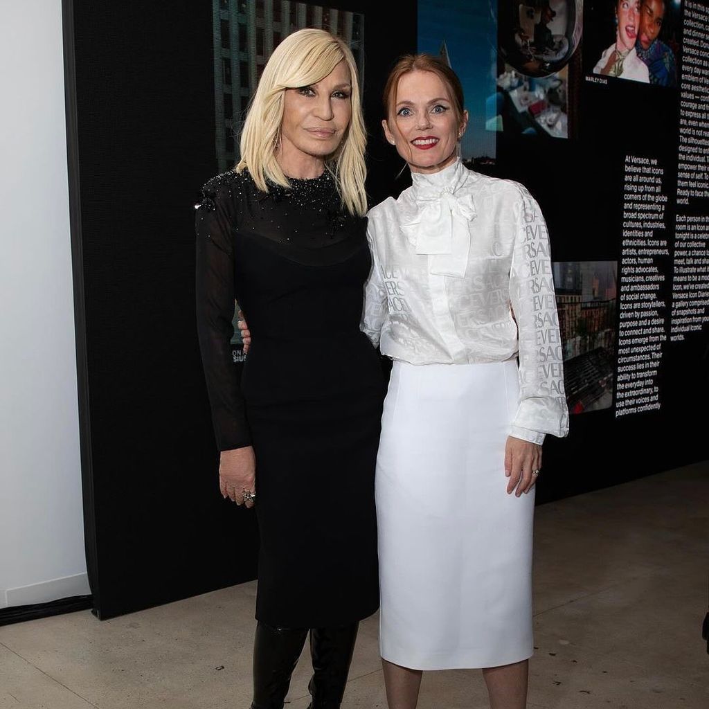 Donatella Versace in black with Geri Halliwell Horner in white