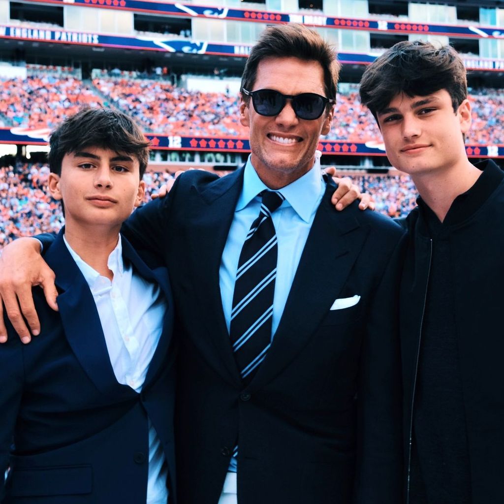 Tom Brady and his sons Jack and Benjamin photographed at his Patriots Hall of Fame induction ceremony