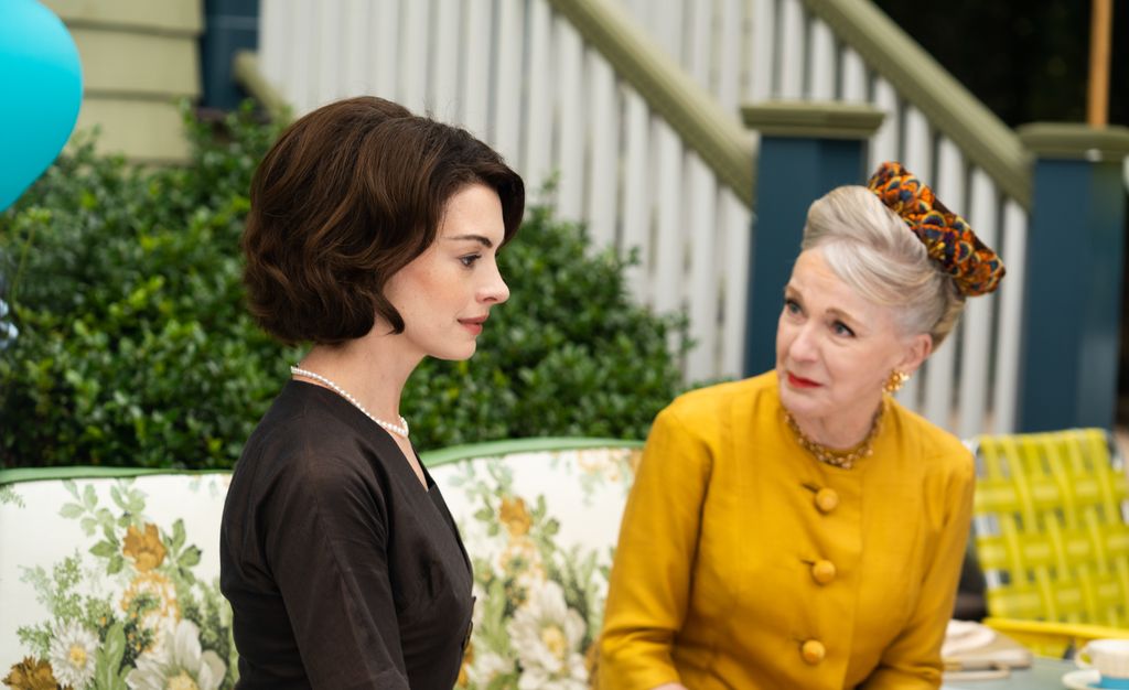 Anne Hathaway as Céline (L) and Caroline Lagerfelt (R) who plays Alice's mother in law