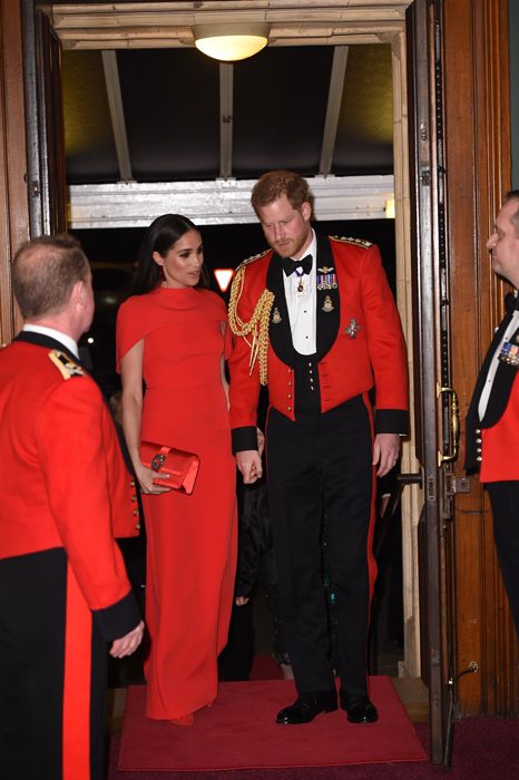 meghan and harry chat away 