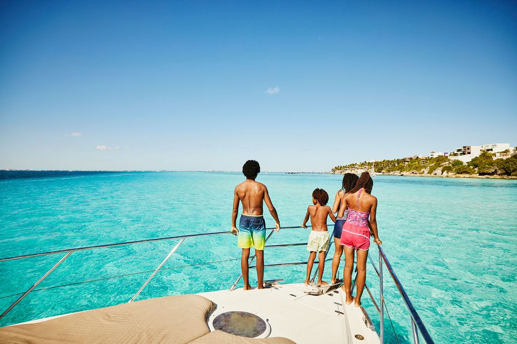 Family on yacht in Caribbean sea