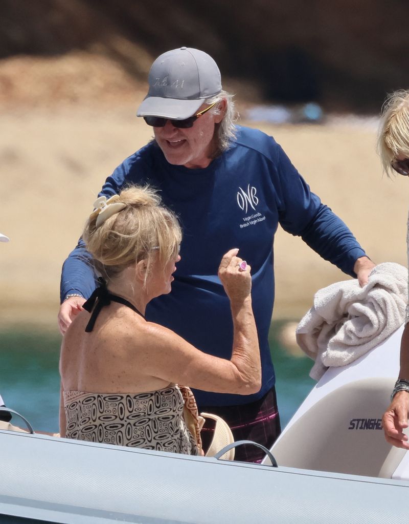 Goldie and Kurt kicked back as they enjoyed a speedboat ride with son Wyatt on the sundrenched island of Skiathos