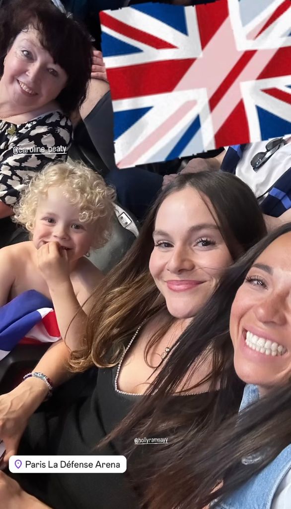 Katya Jones and Holly Ramsay with Adam Peaty's son George at the Paris Olympics