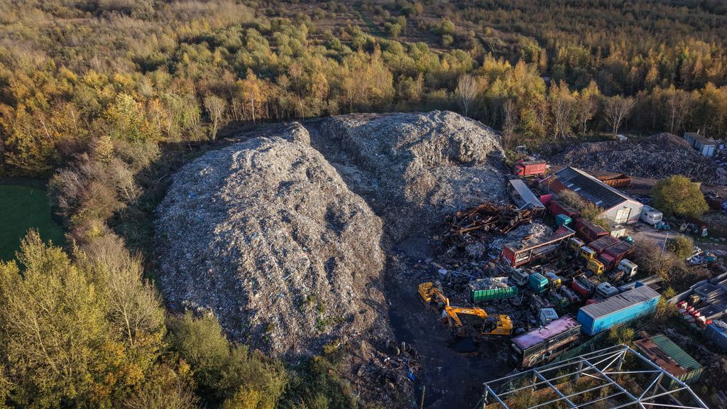 An aerial view of the 25,000 tonnes of waste that has been dumped near to residential homes in Bickershaw on October 29, 2025 in Wigan, England