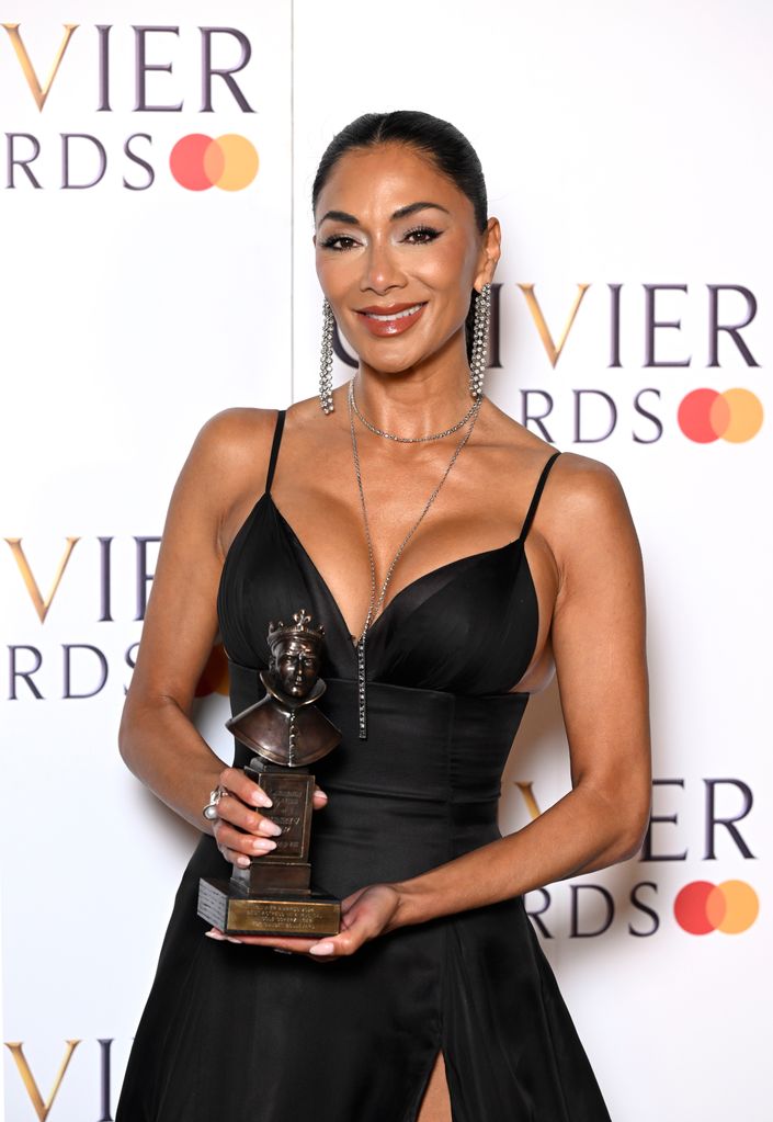 Nicole posing with the award for Best Actress in a Musical for "Sunset Boulevard" in the winners room at The Olivier Awards 2024