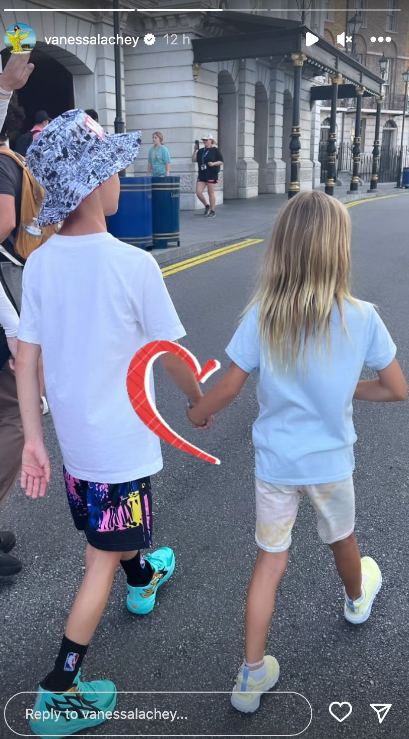 Vanessa Lachey's son Camden and daughter Brooklyn holding hands at Universal Orlando 