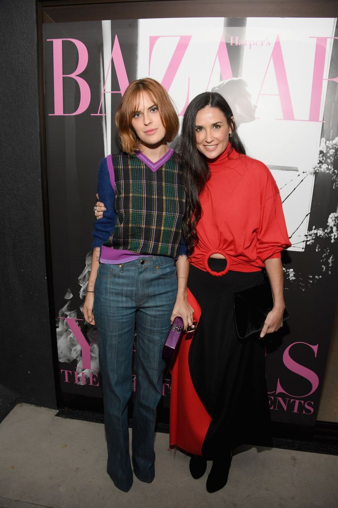 Demi Moore standing with her arm around Tallulah Willis