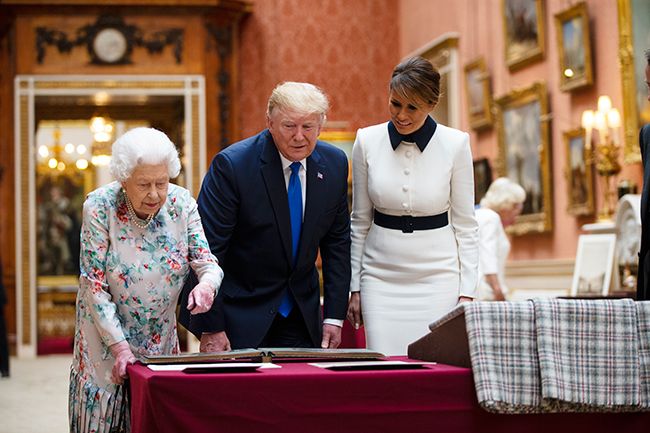 the trumps are given a tour of palace