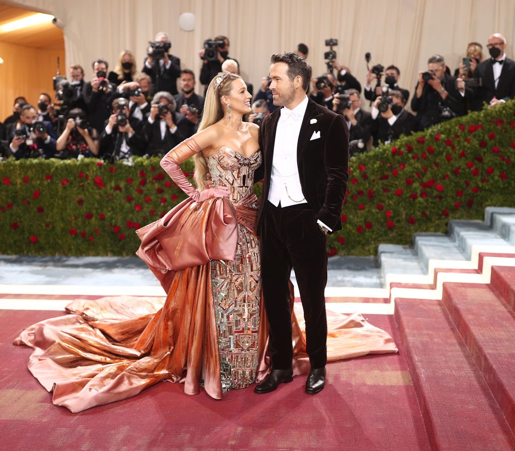 Blake Lively looks at Ryan Reynolds with love at the Met Gala
