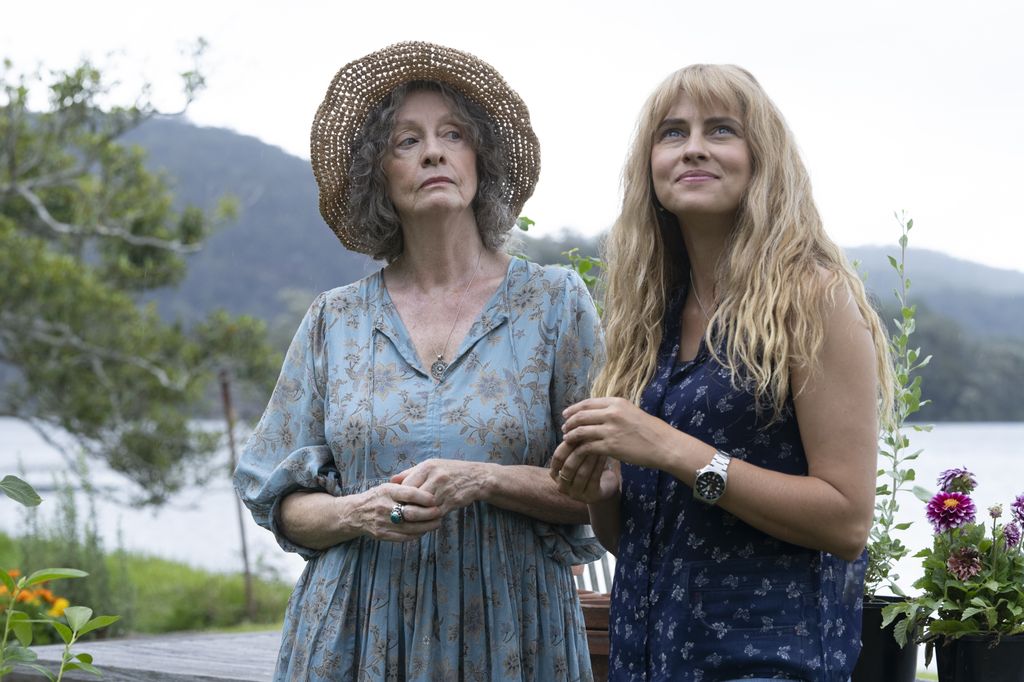 older woman and younger woman in garden 