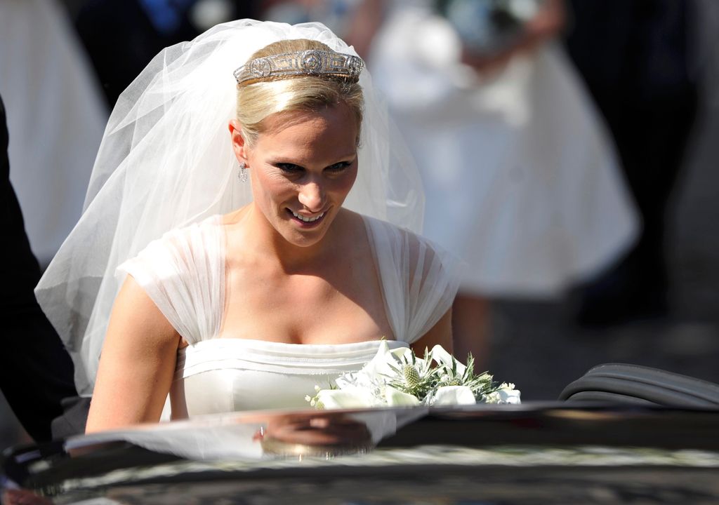 Zara Tindall leaves the church after the Royal wedding of Zara Phillips and Mike Tindall at Canongate Kirk on July 30, 2011 in Edinburgh, Scotland. The Queen's granddaughter Zara Phillips will marry England rugby player Mike Tindall today at Canongate Kirk. Many royals are expected to attend including the Duke and Duchess of Cambridge.    (Photo by Dylan Martinez - WPA Pool/Getty Images)