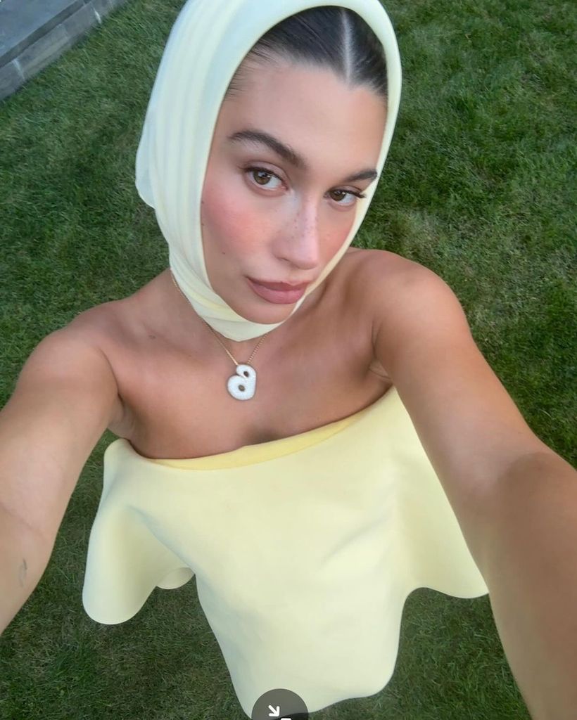 Hailey Bieber wears lemon yellow maternity dress