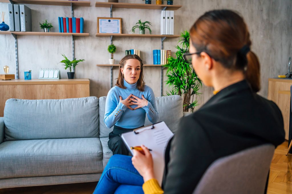 Young woman having a therapeutic session with a psychologist