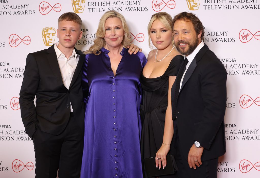 Alfie Graham, Hannah Walters, Grace Graham and Stephen Graham pose in the winners room at the Virgin Media British Academy Television Awards at The Royal Festival Hall on May 08, 2022