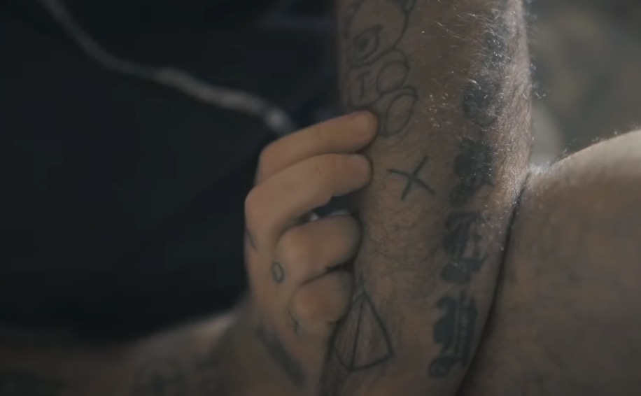 Robbie Williams' X tattoo
