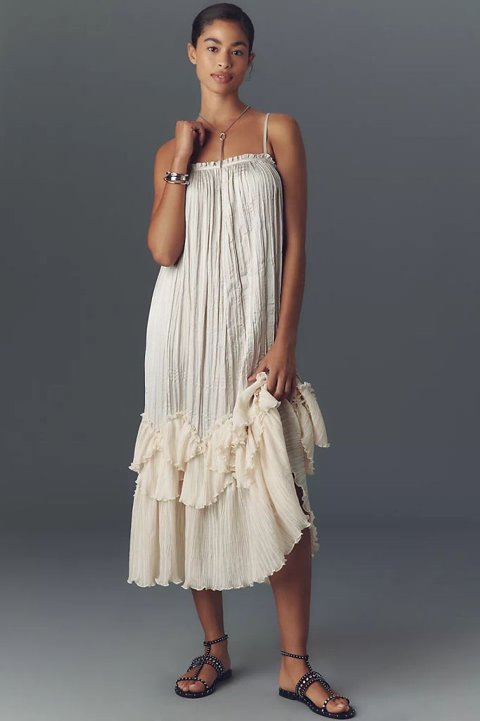 white pleated dress with shapeless fit