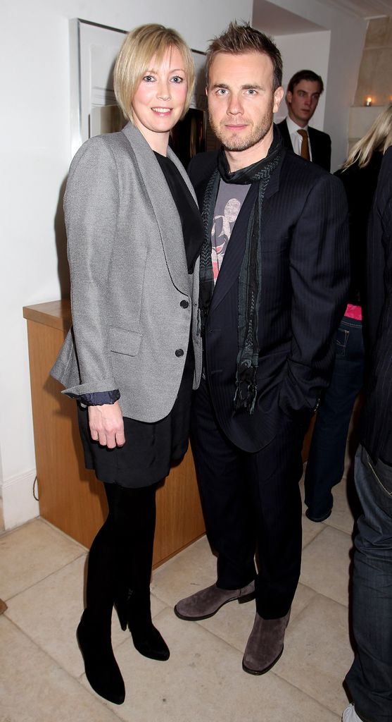 Gary Barlow and wife Dawn smiling at an event together 