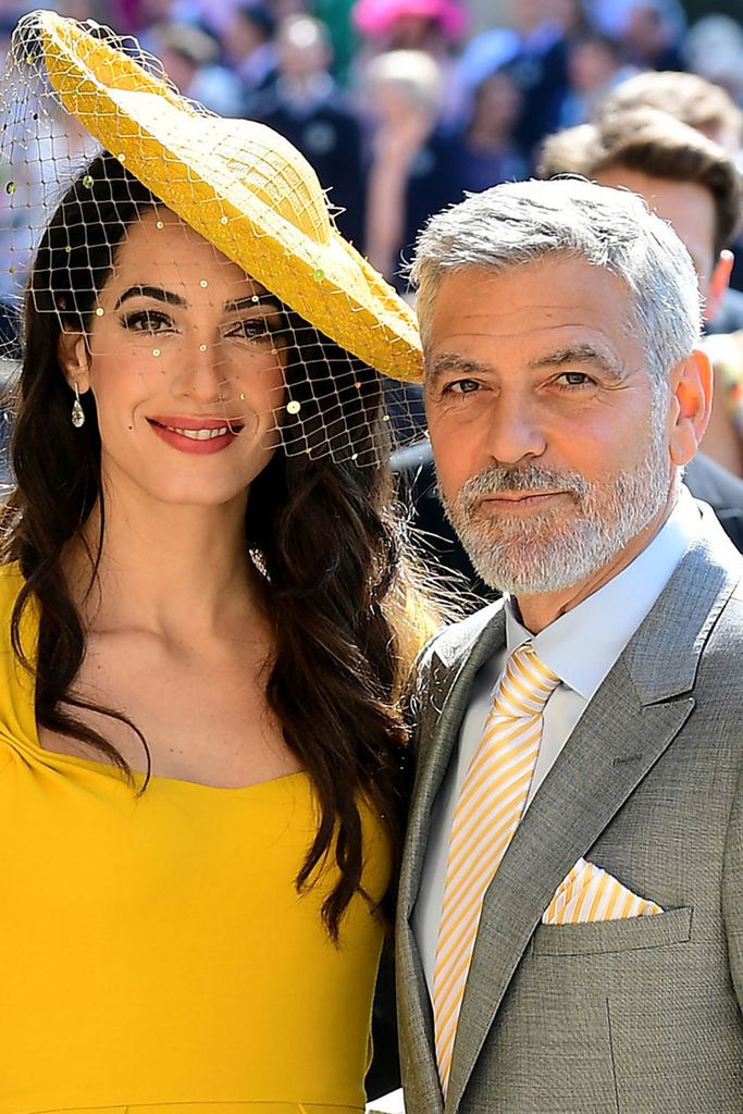 Amal and George Clooney arrive at St George's Chapel at Windsor Castle before the wedding of Prince Harry to Meghan Markle on May 19, 2018 in Windsor, England. (Photo by Ian West - WPA Pool/Getty Images)