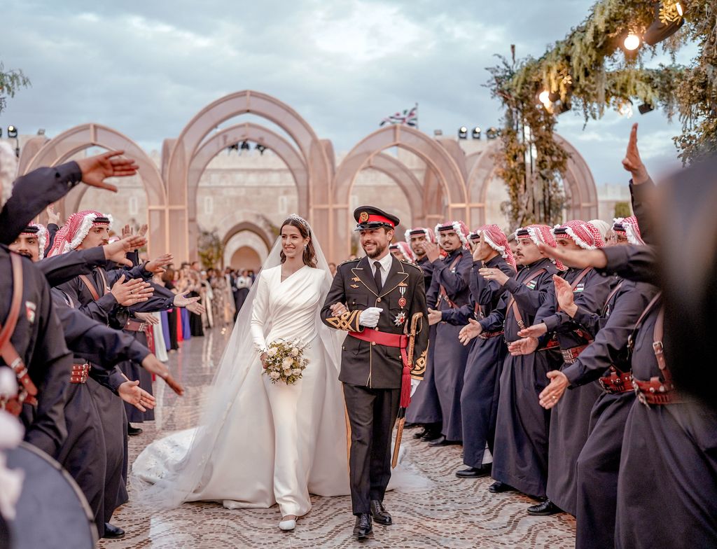 Jordan Crown Prince Al Hussein and Princess Rajwa Al Hussein depart Zahran palace during their wedding on June 01, 2023 in Amman, Jordan.