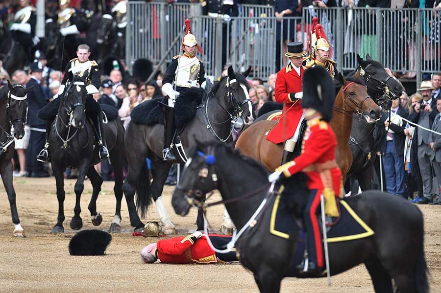 soldier falls during trooping