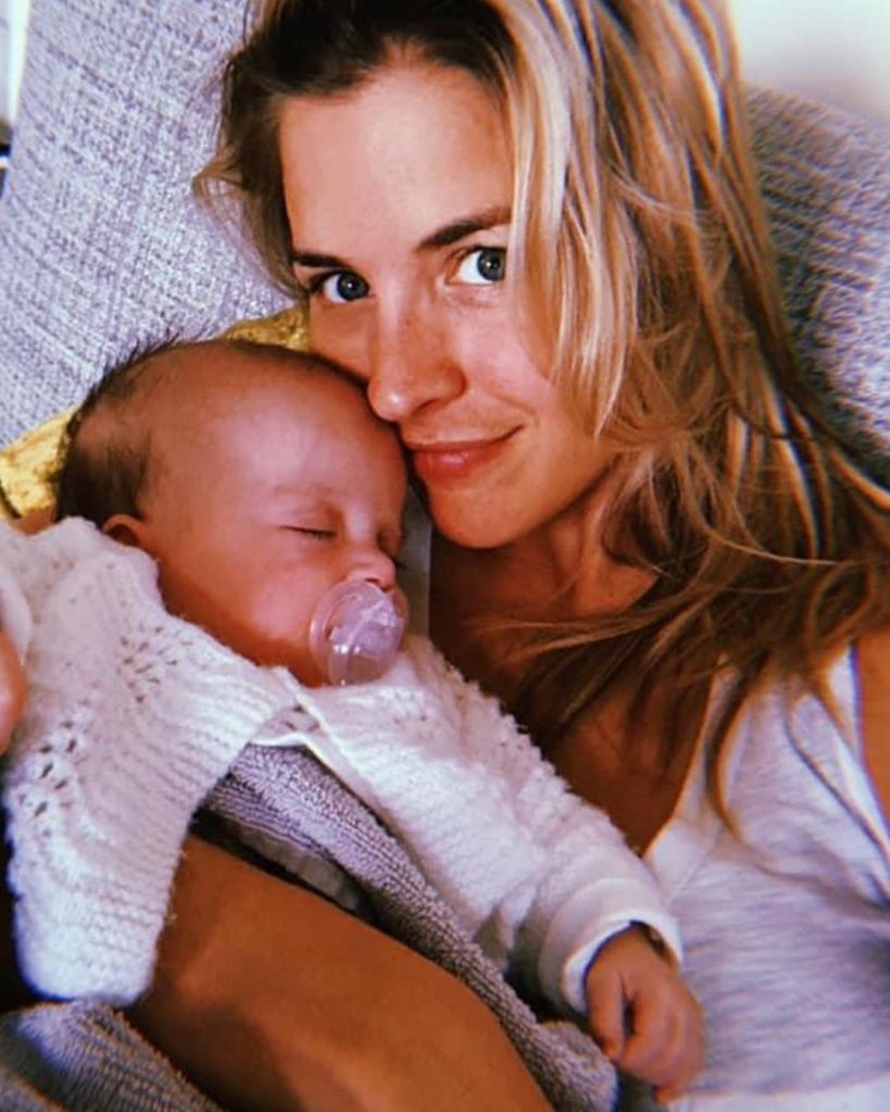 gemma atkinson holding sleeping baby daughter mia 