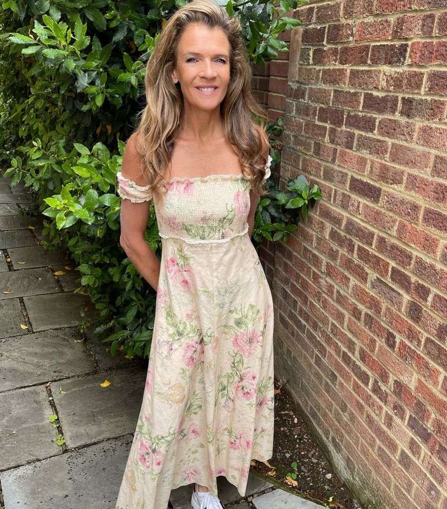 Annabel Croft wearing a bardot off the shoulder dress at wimbledon