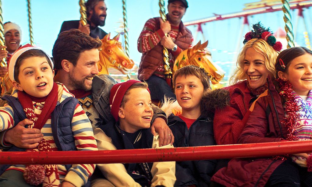 parents on carousel with children
