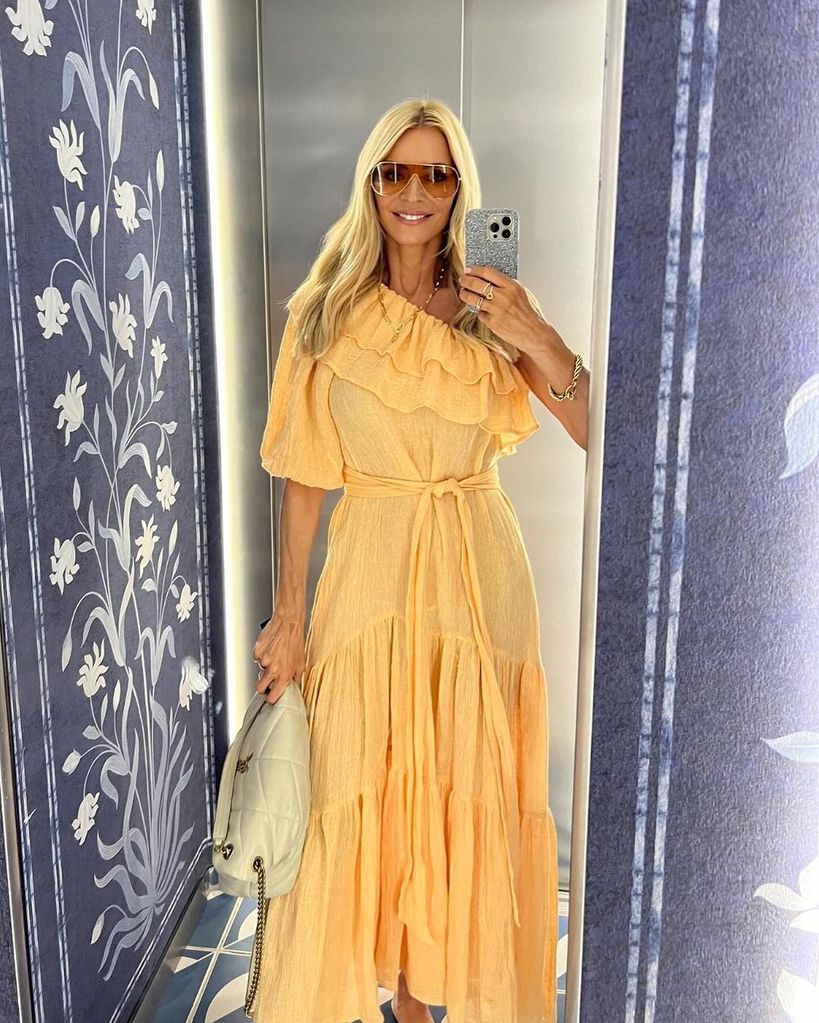 Tess Daly in a yellow ruffled dress